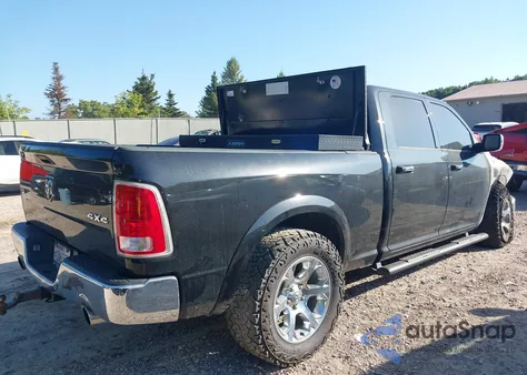 2018 Ram 1500 Laramie 4X4 6'4 Box z USA, uszkodzony, nr VIN 1C6RR7VM2JS240519